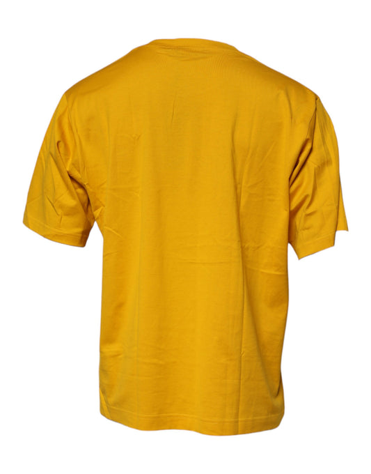 Yellow short sleeved shirt on hanger