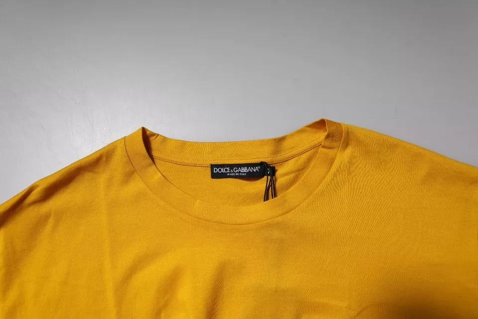 Yellow short sleeve t-shirt on hanger