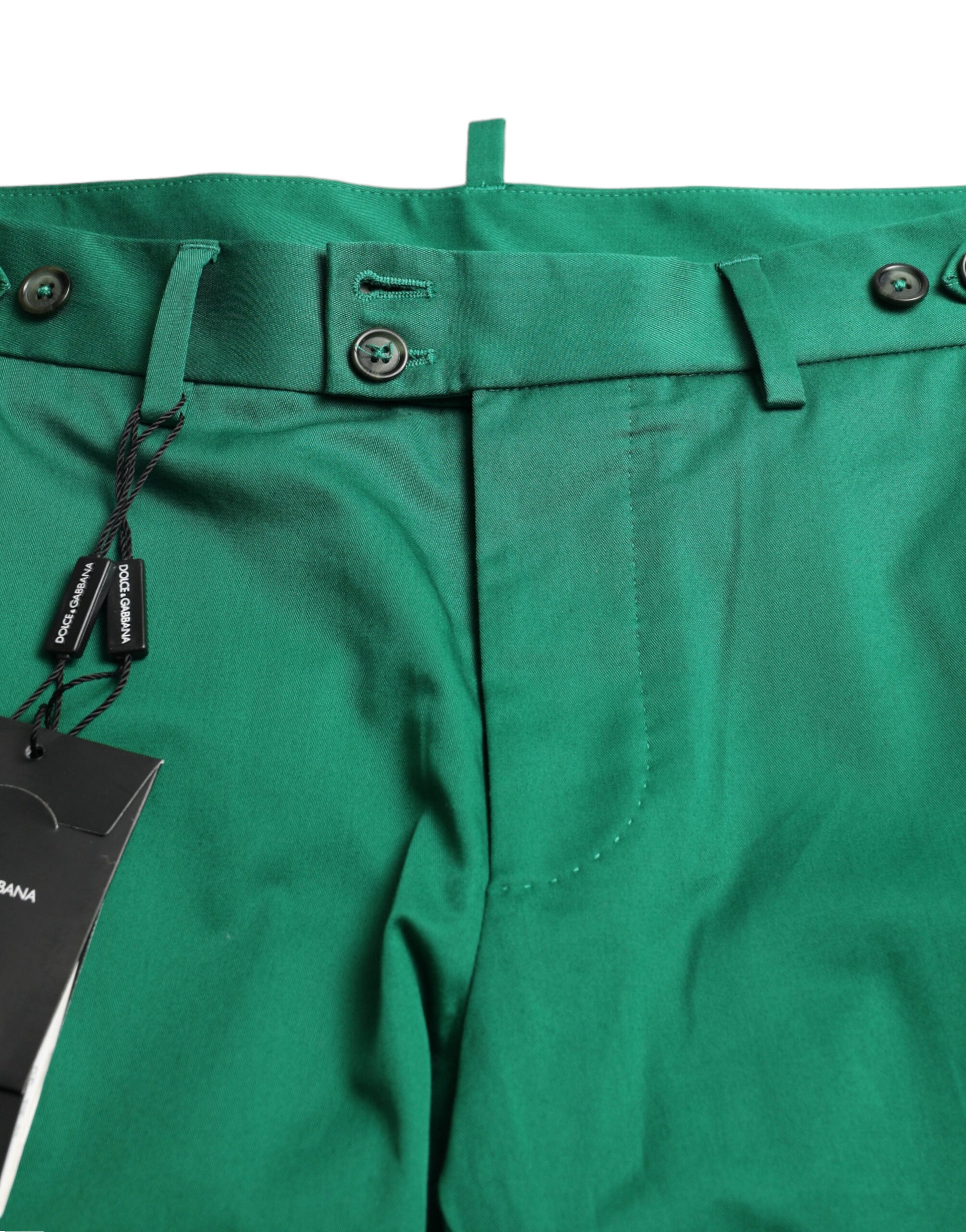 Green pants on a hanger
