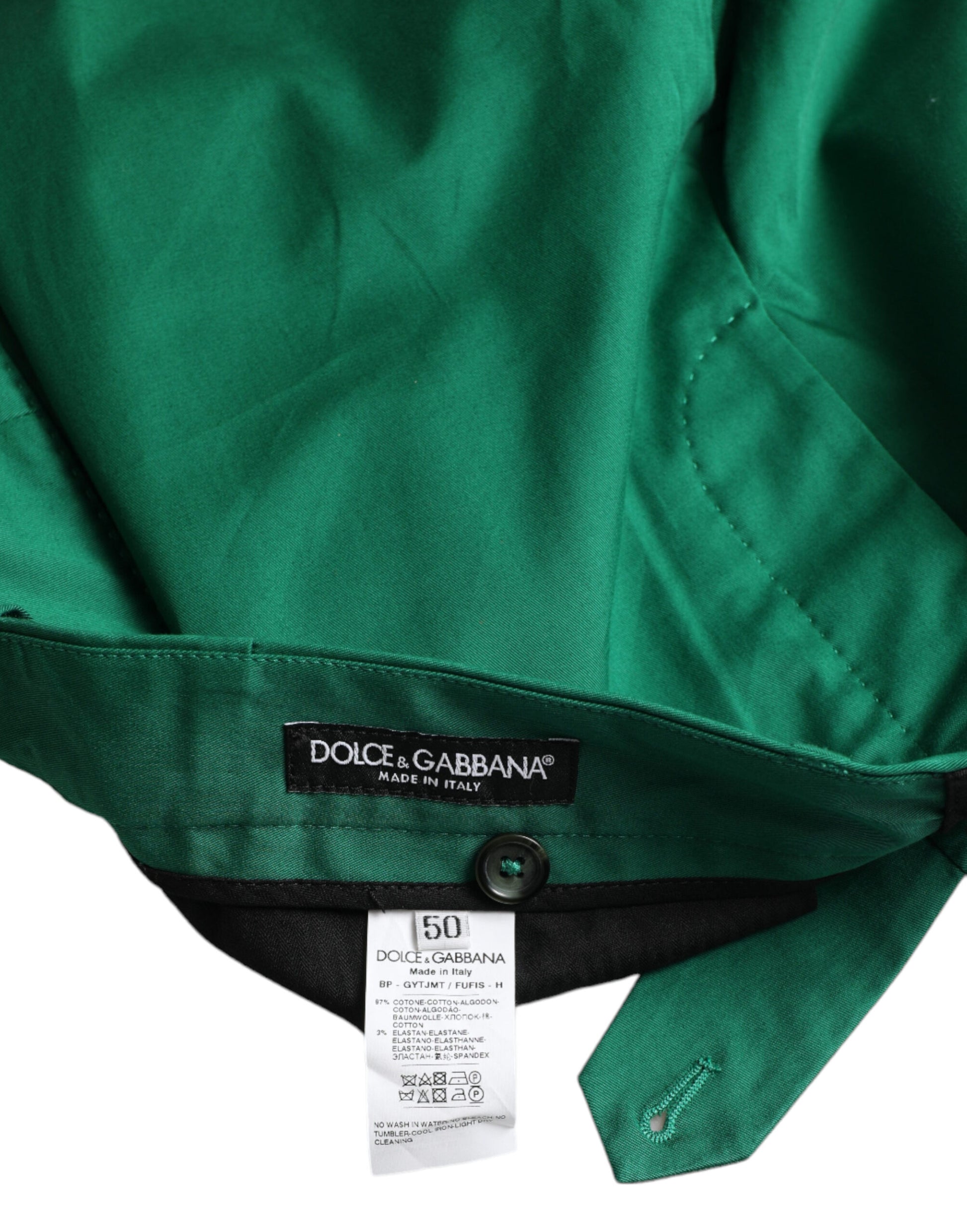 Green jacket with black label on sleeve
