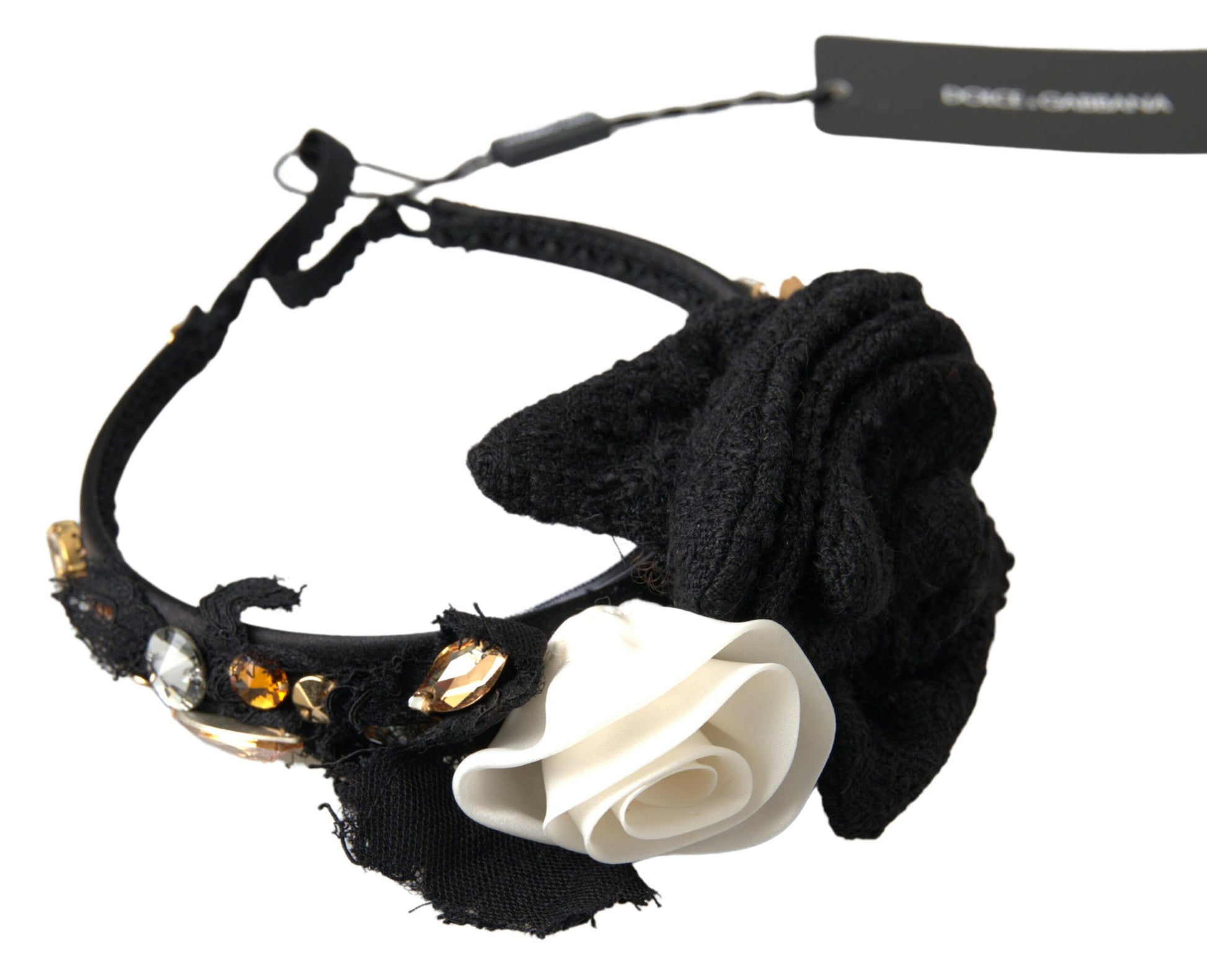 Black and white headband with a bow and flower embellishments