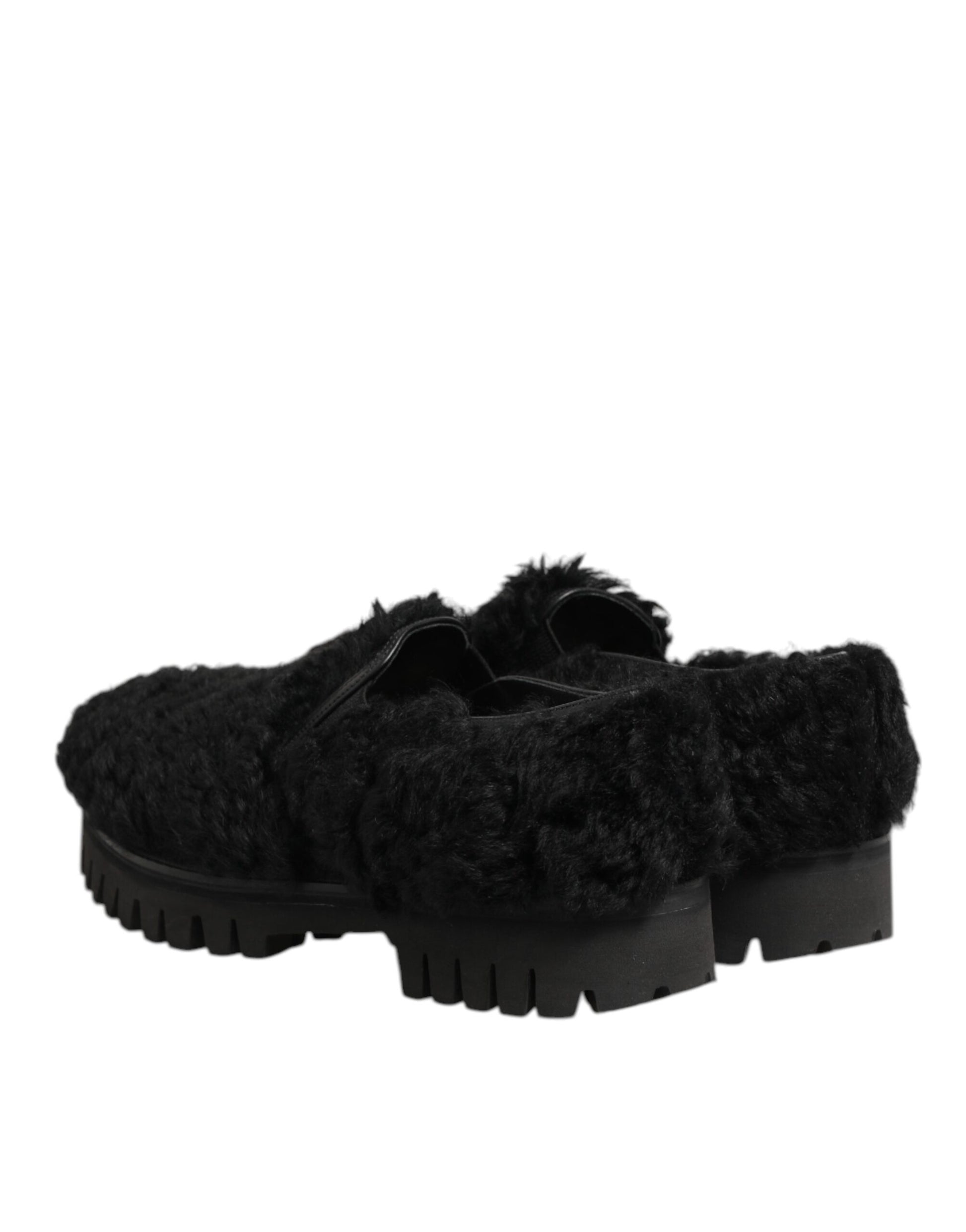 A pair of black fur lined leather shoes with a chunky sole, designed for men