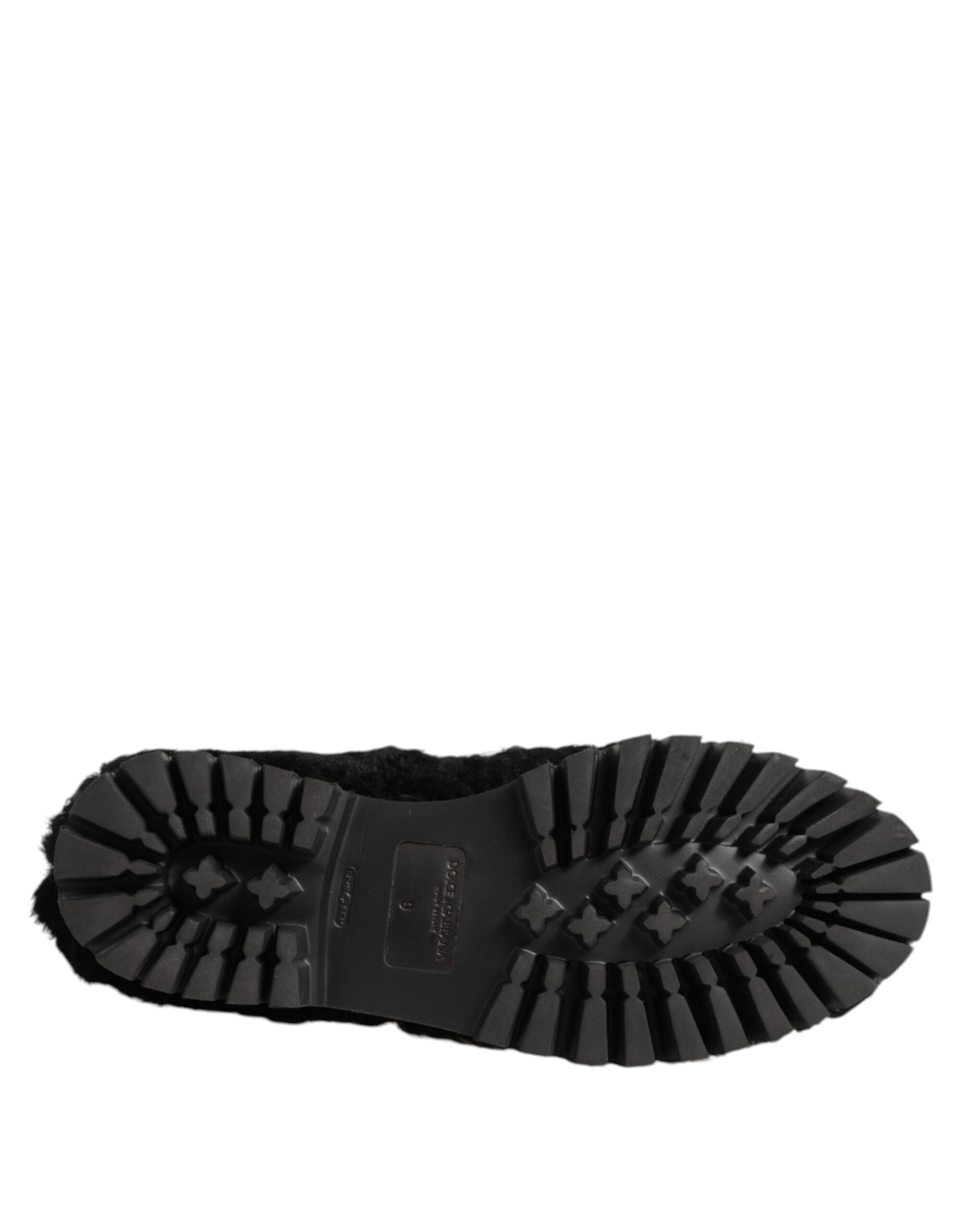 A pair of black fur leather slippers with a buckle closure, designed for men