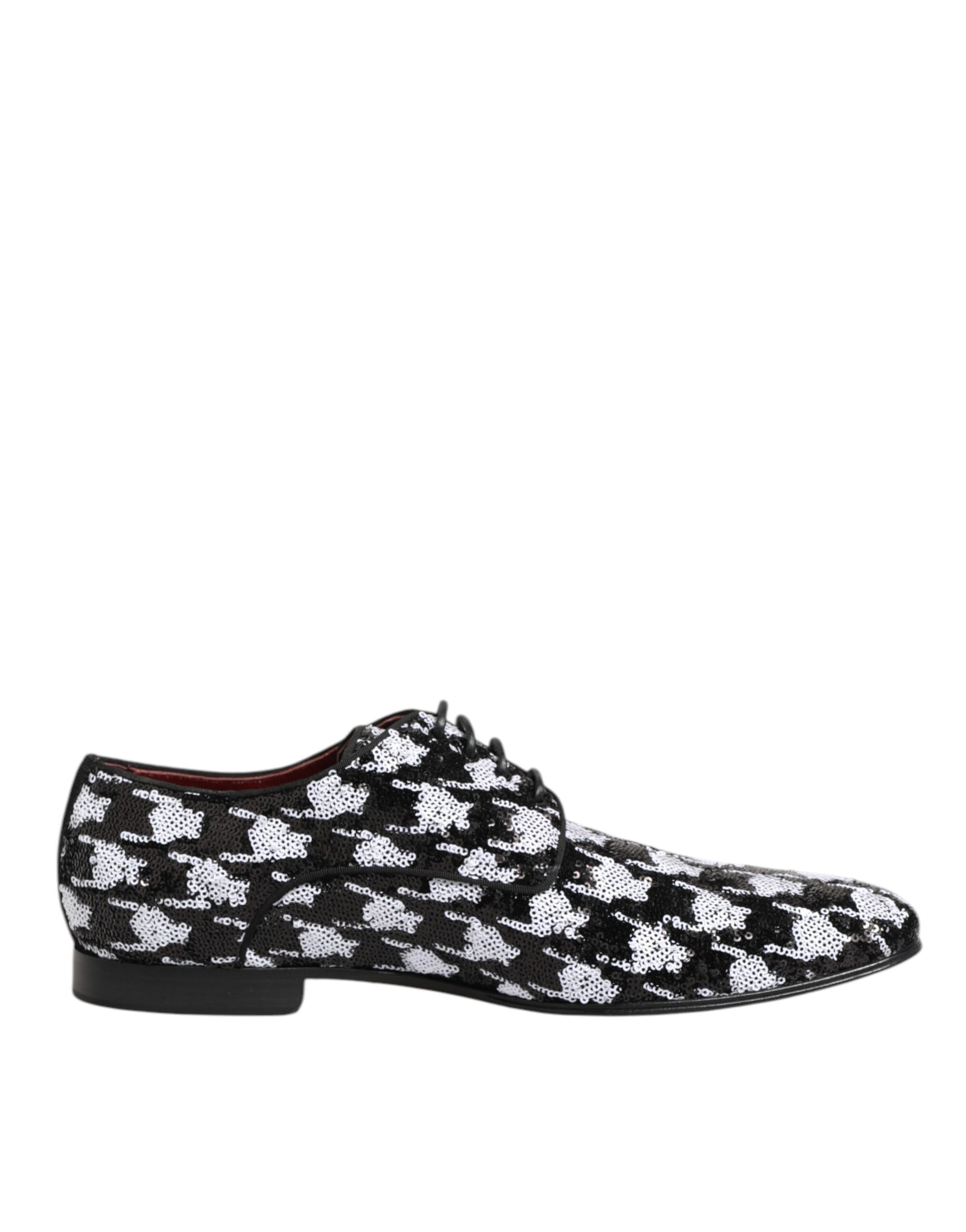 A pair of black and white sequined lace-up dress shoes by Dolce & Gabbana