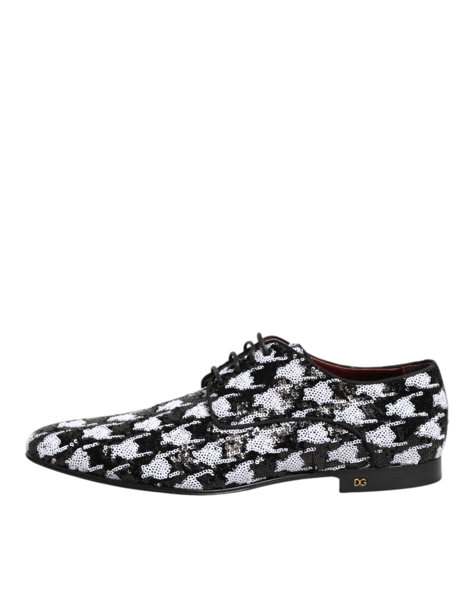 A pair of black and white sequined lace-up derby shoes by Dolce & Gabbana