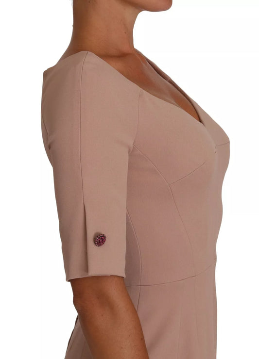 A dusty pink midi sheath dress with crystal buttons from Dolce & Gabbana