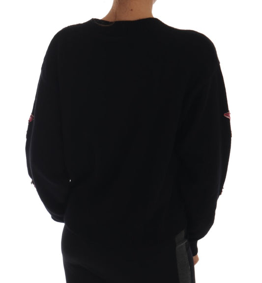 Black long sleeve sweater on person