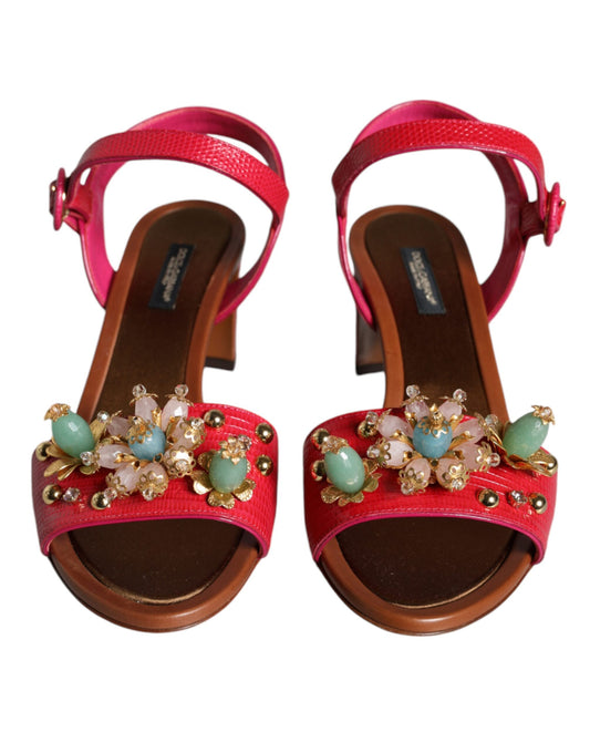 Pair of red sandals with embellishments