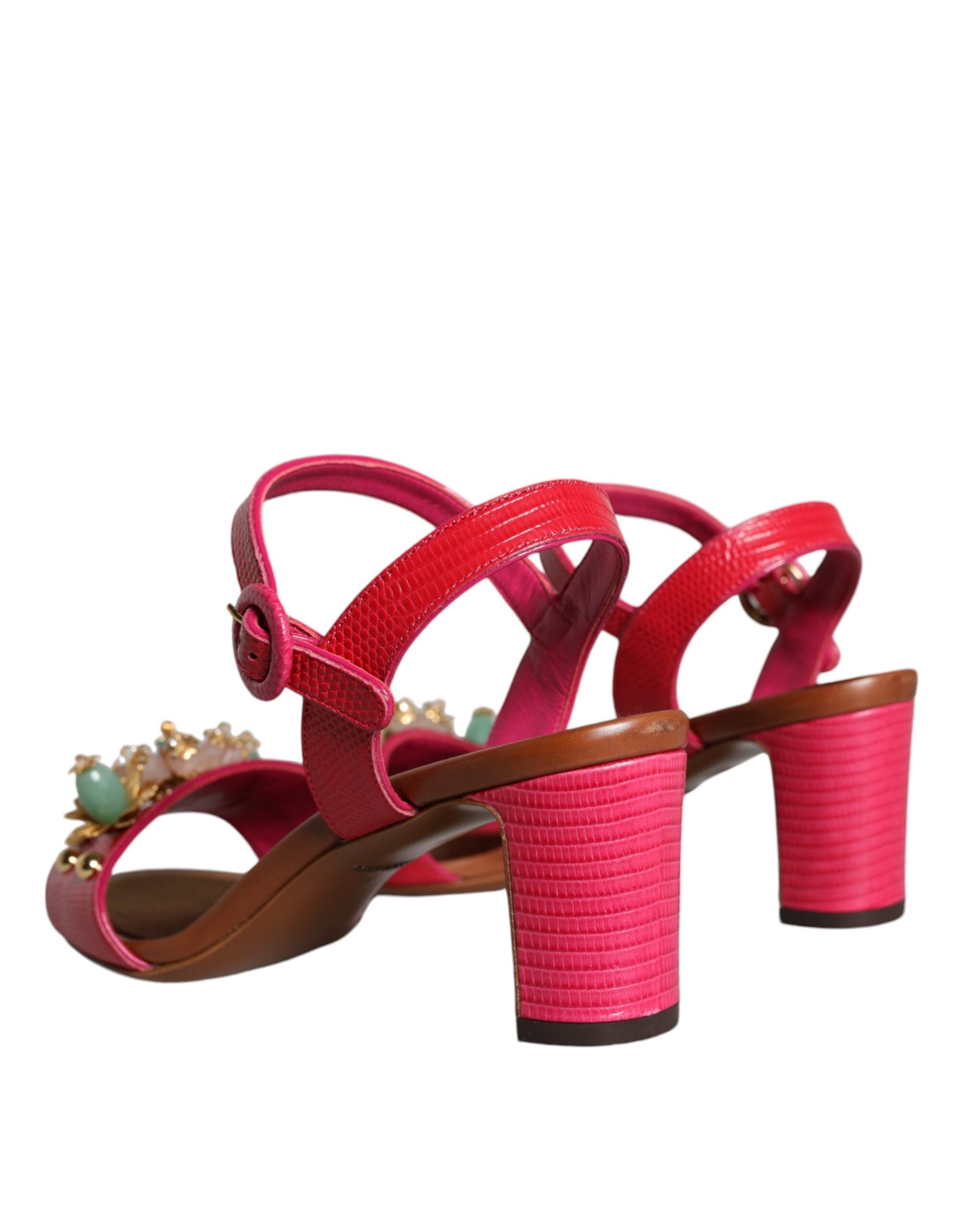 Pair of red strappy heels with brown trim