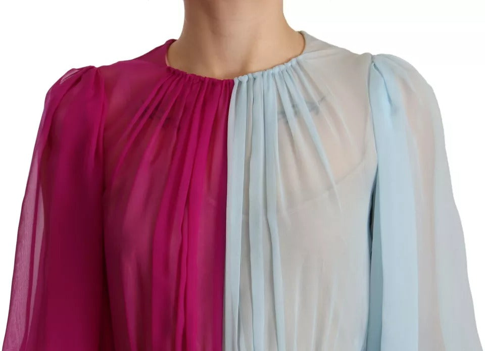 A two-tone midi dress in fuchsia and light blue silk