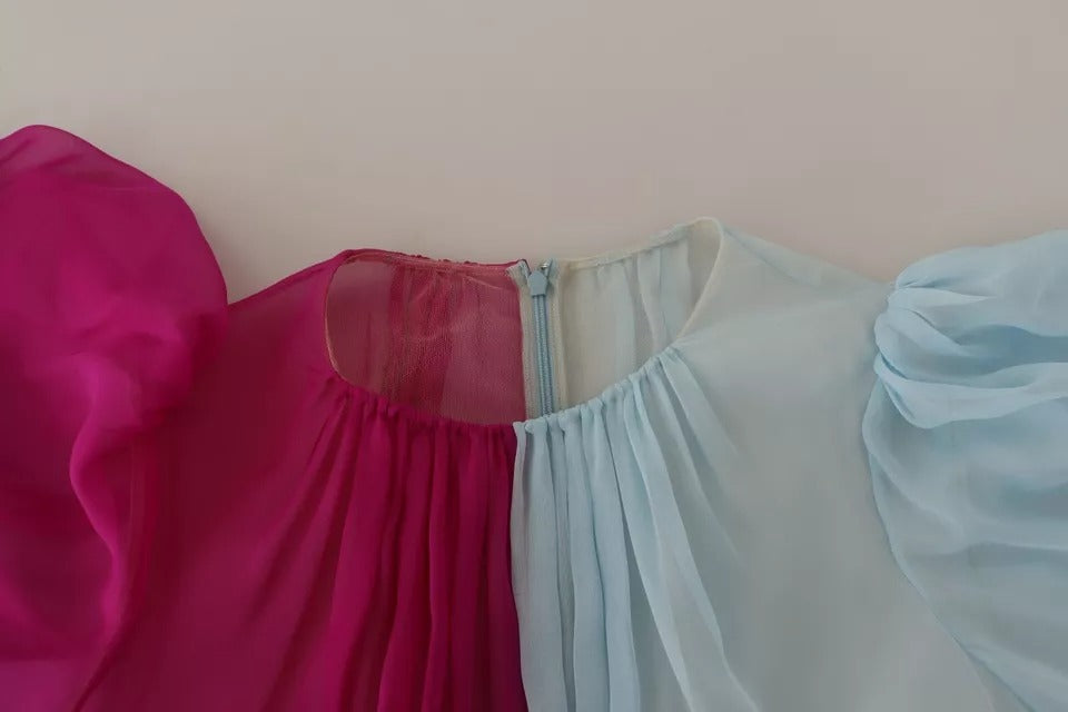 A two-tone midi dress with a fuchsia top and light blue bottom