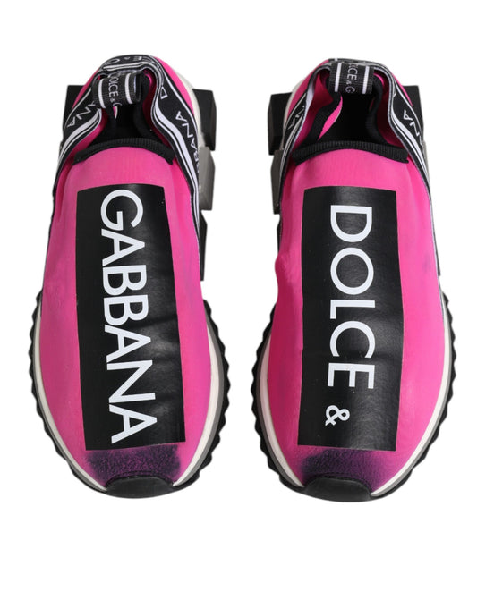 Pink sneakers with white lettering on soles