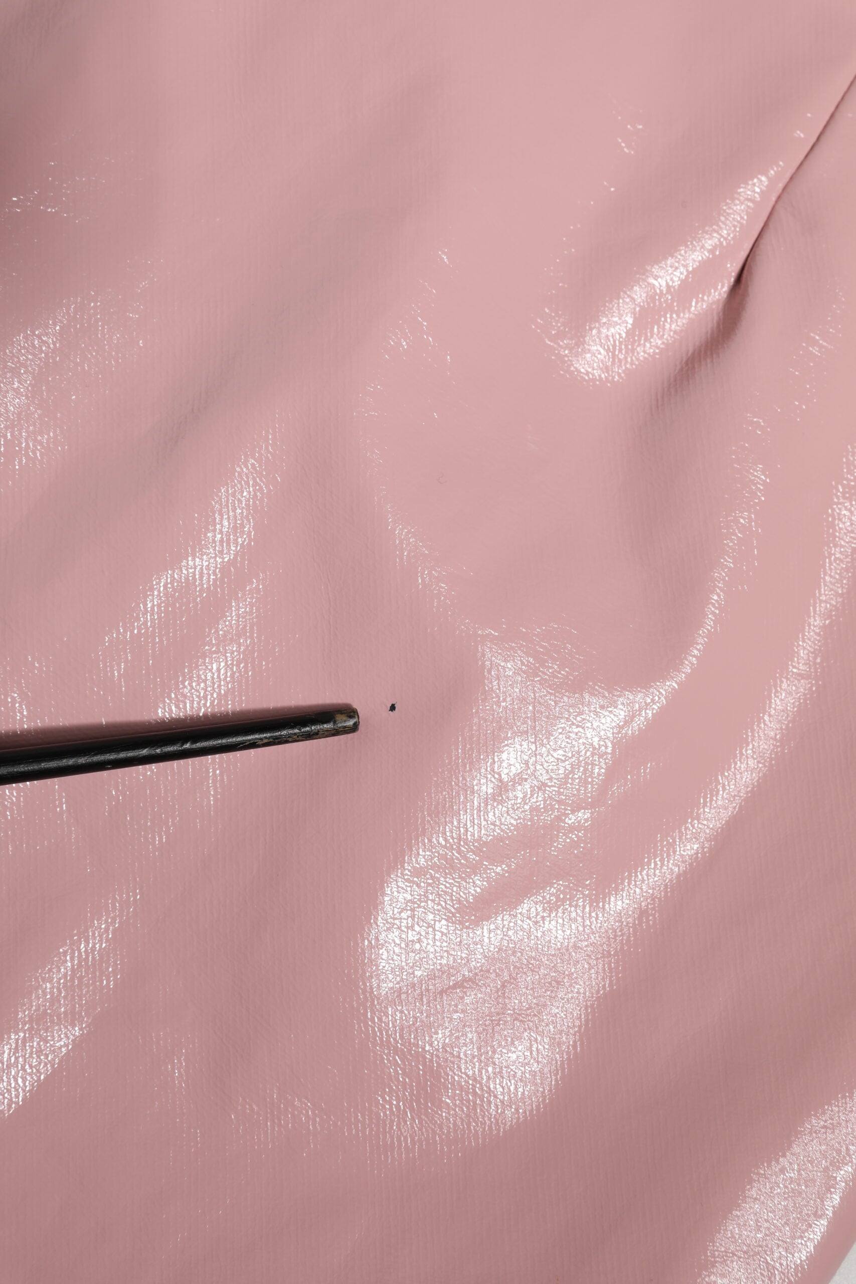 Pink fabric with glittery texture
