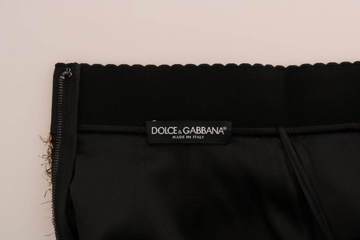 Black pants with a label on the waistband
