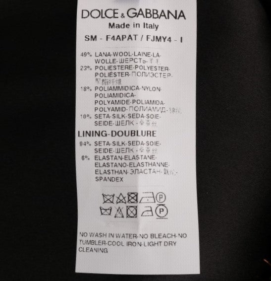 Tag on a garment indicating brand, material, care instructions, and size