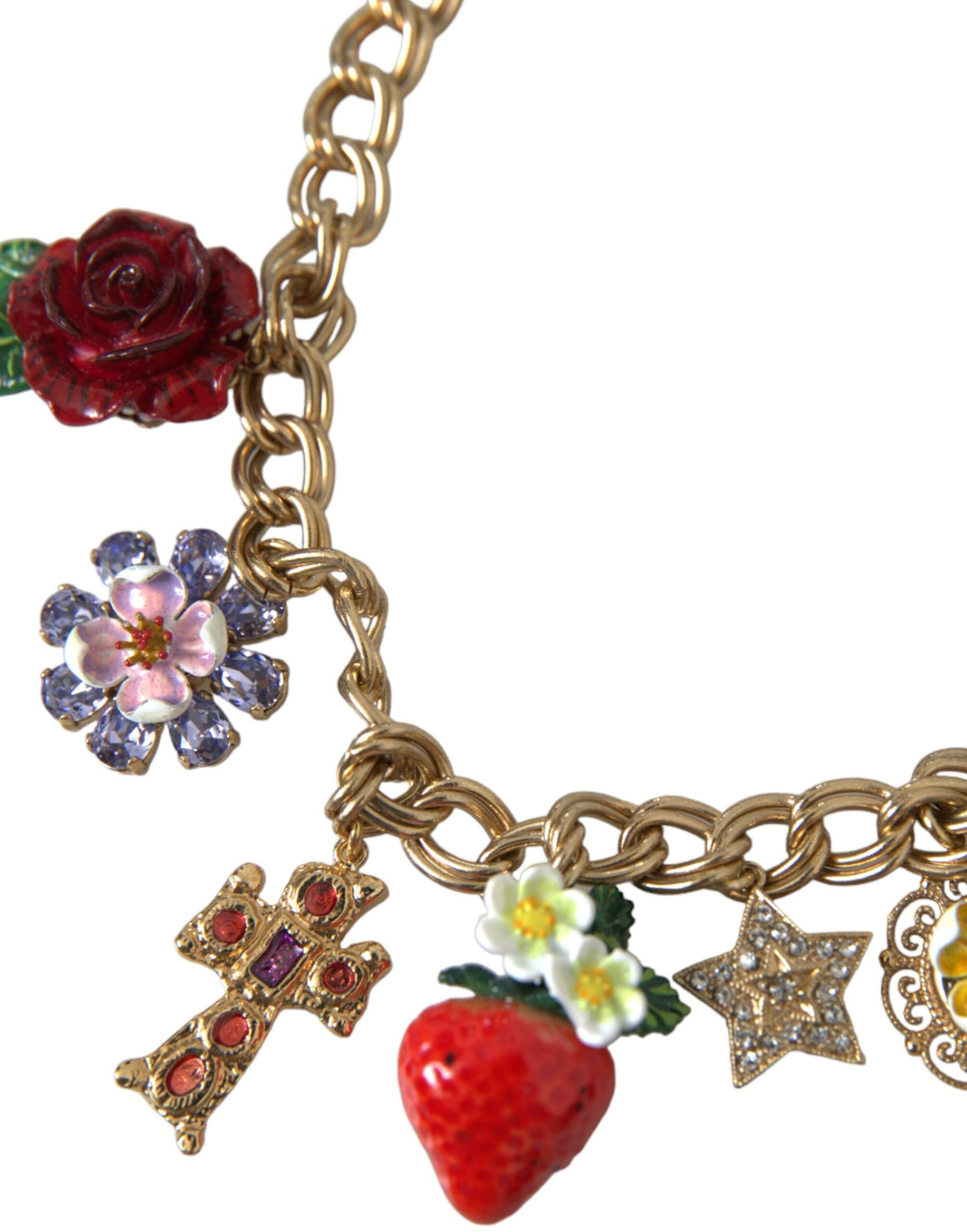 Gold necklace with red roses, pink flowers, blue stones, cross, star, strawberry, and heart charms