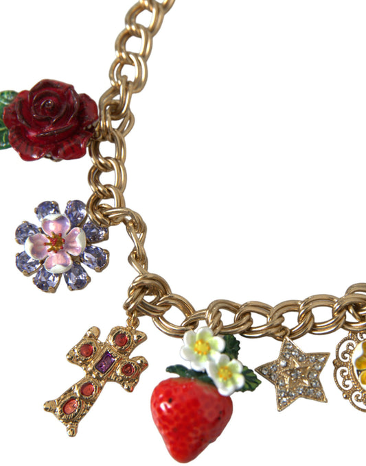 Gold necklace with red roses, pink flowers, blue stones, cross, star, strawberry, and heart charms