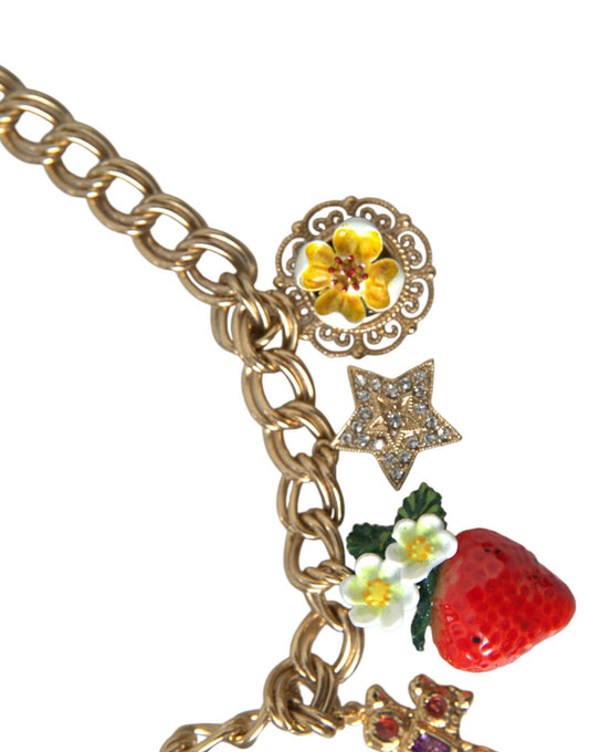 Gold chain necklace with floral design, star, strawberry, flower and cross charm
