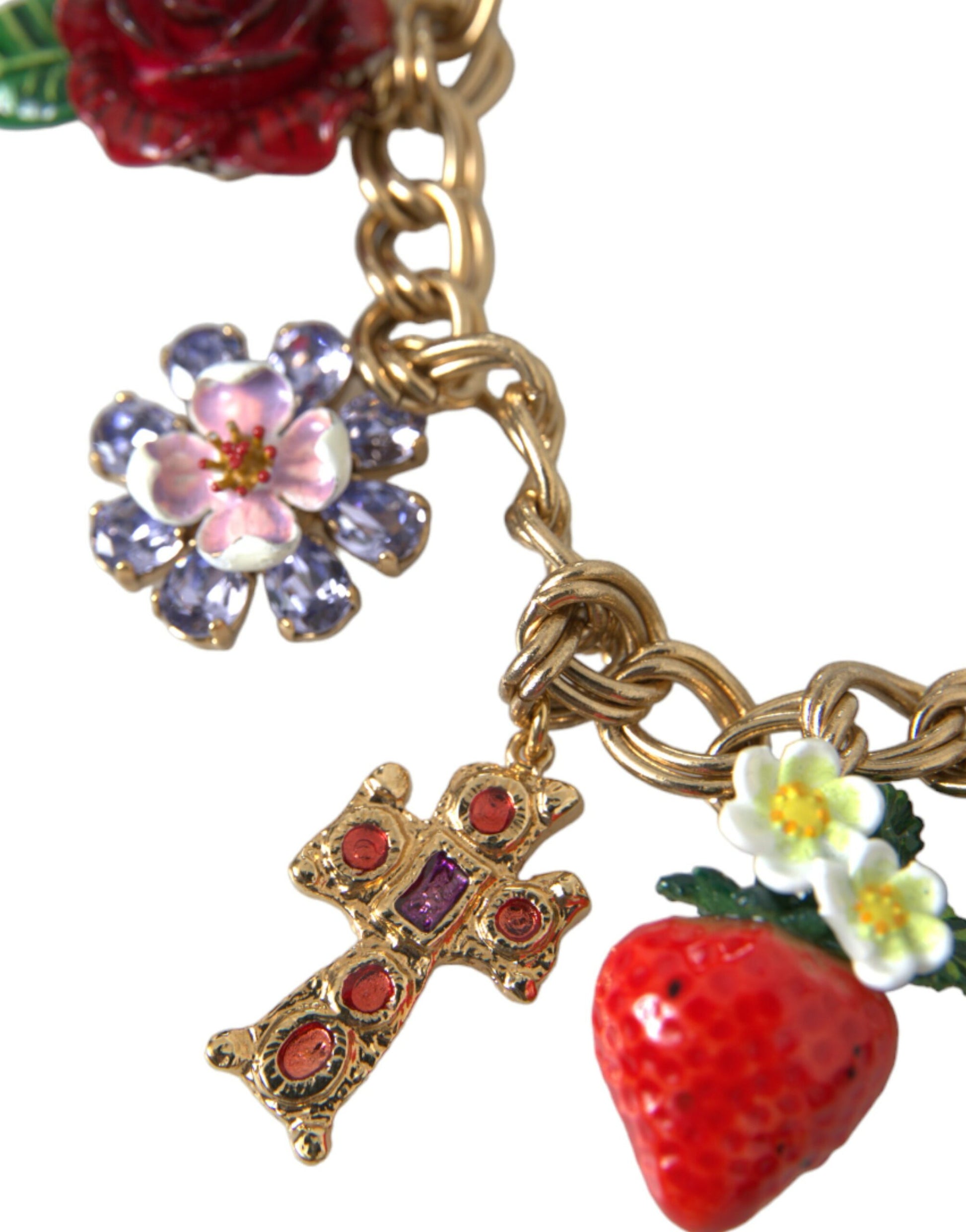 Gold chain bracelet with floral charms and a cross pendant