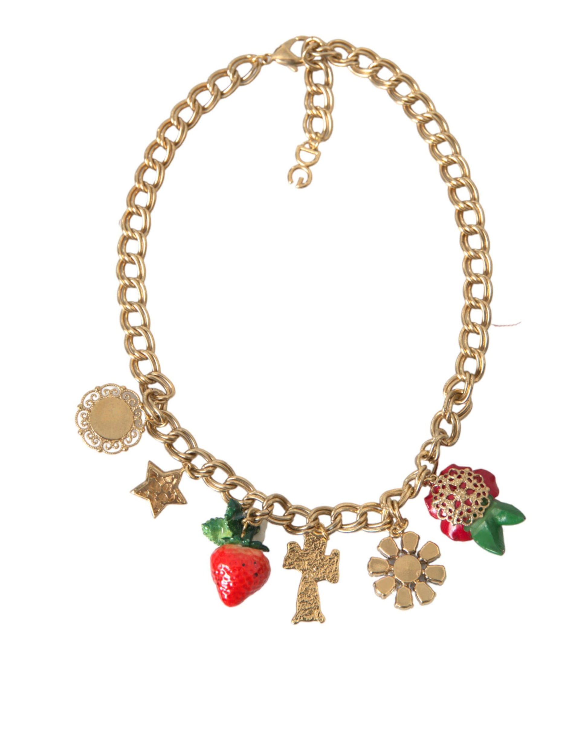 Gold necklace with charms including a cross, star, flower, and strawberry