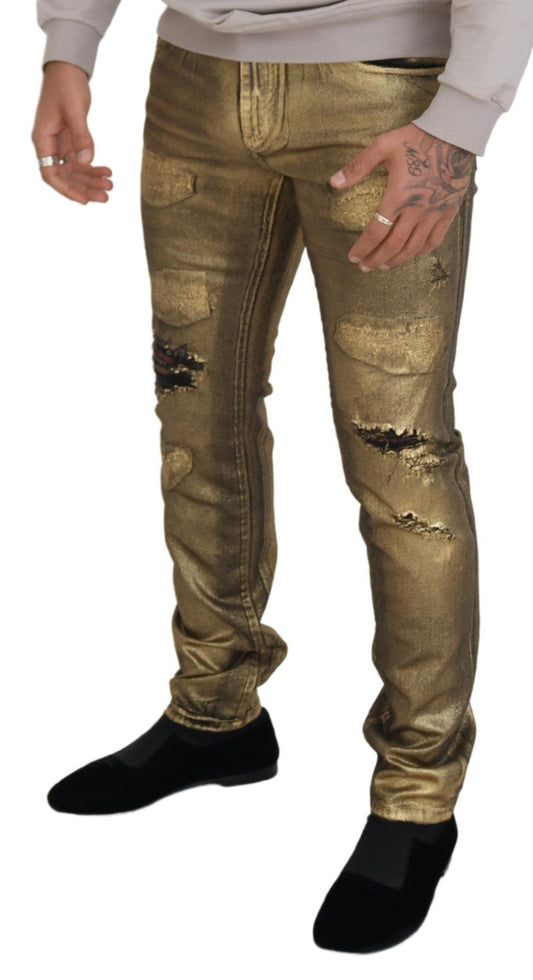 Man wearing gold pants and black shoes