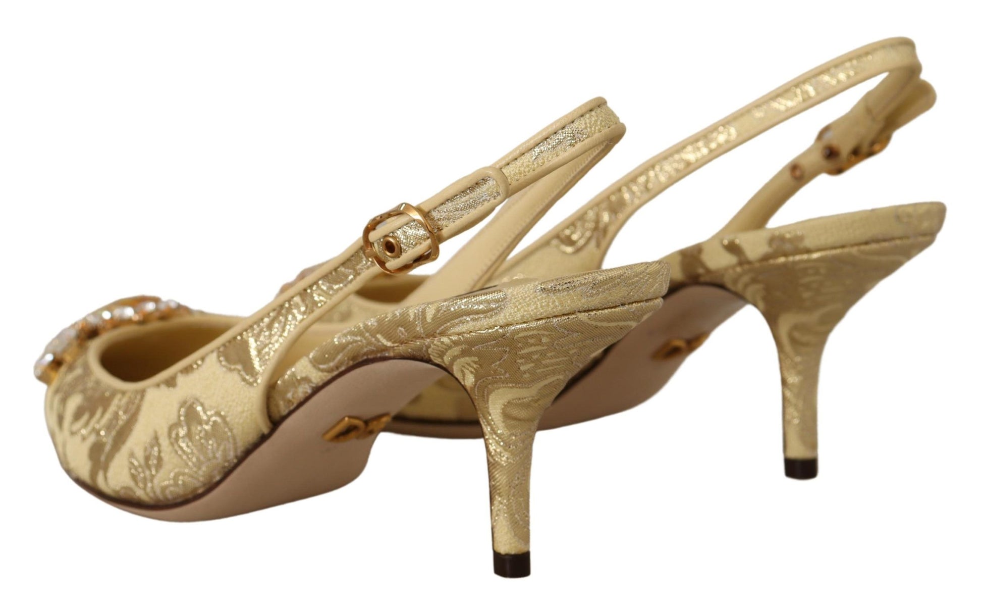 Pair of gold high heel shoes with embroidery and rhinestones