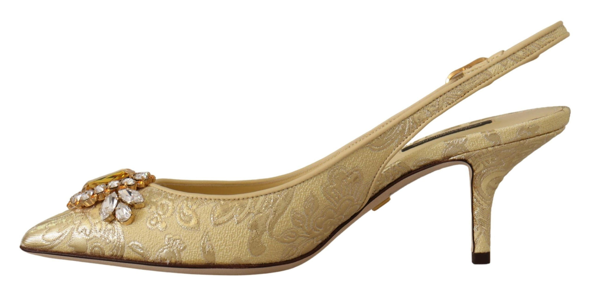 Gold high heel shoe with embellishments and a strap over the toe