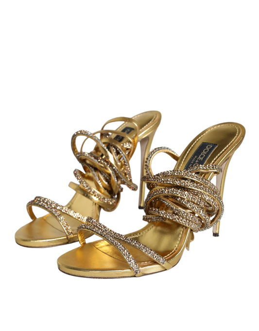 Gold strappy high heel shoes with rhinestones