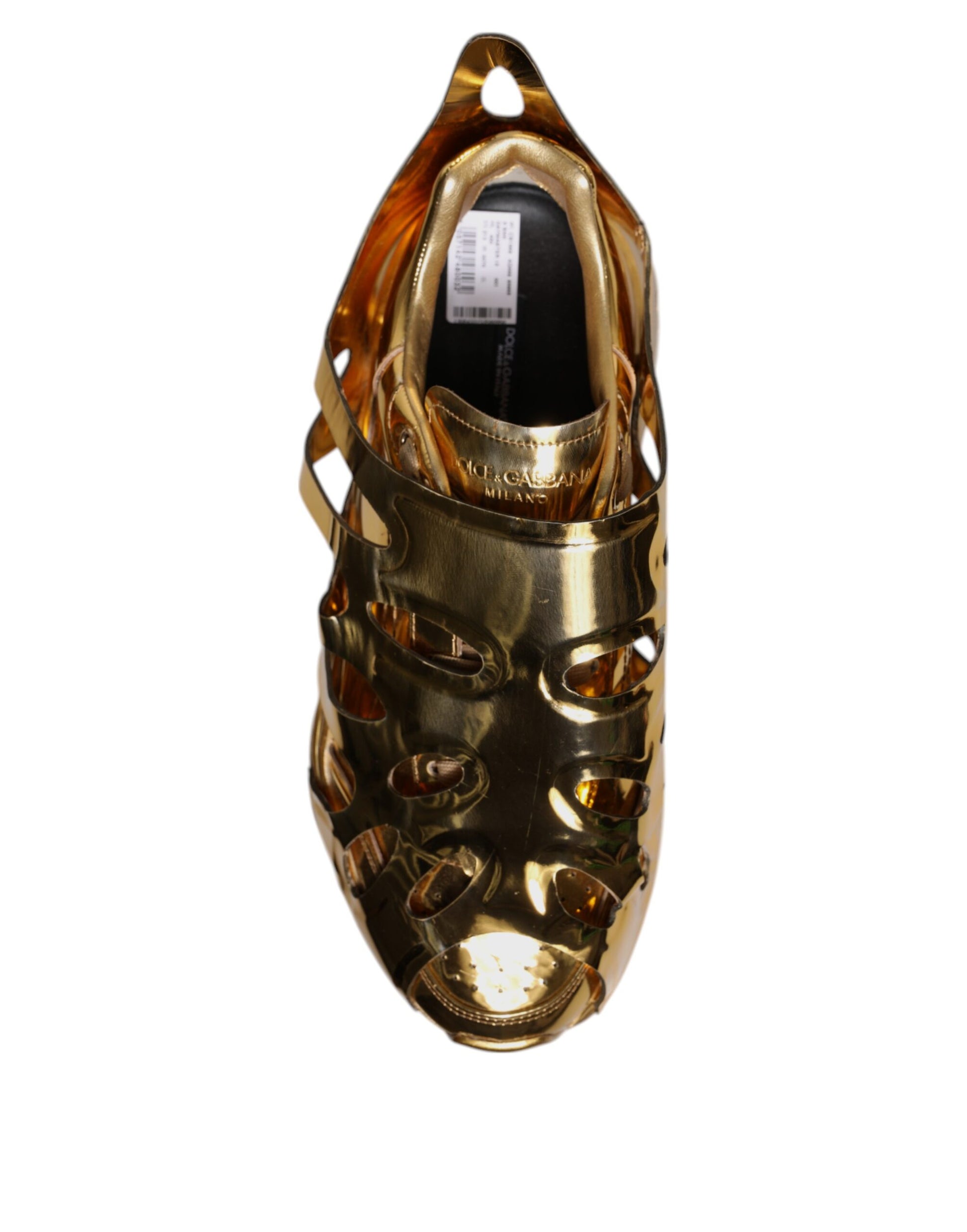 Gold sandal with strap over foot