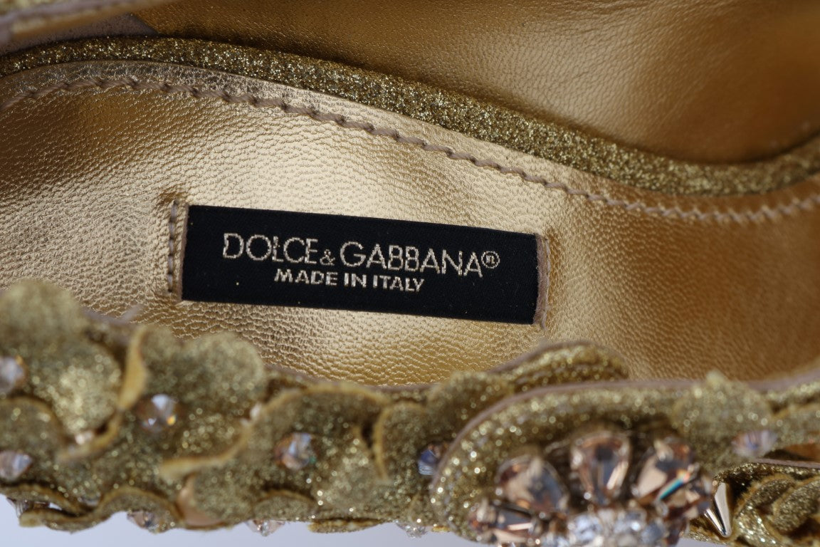 Gold glittery shoe with a bow and rhinestones