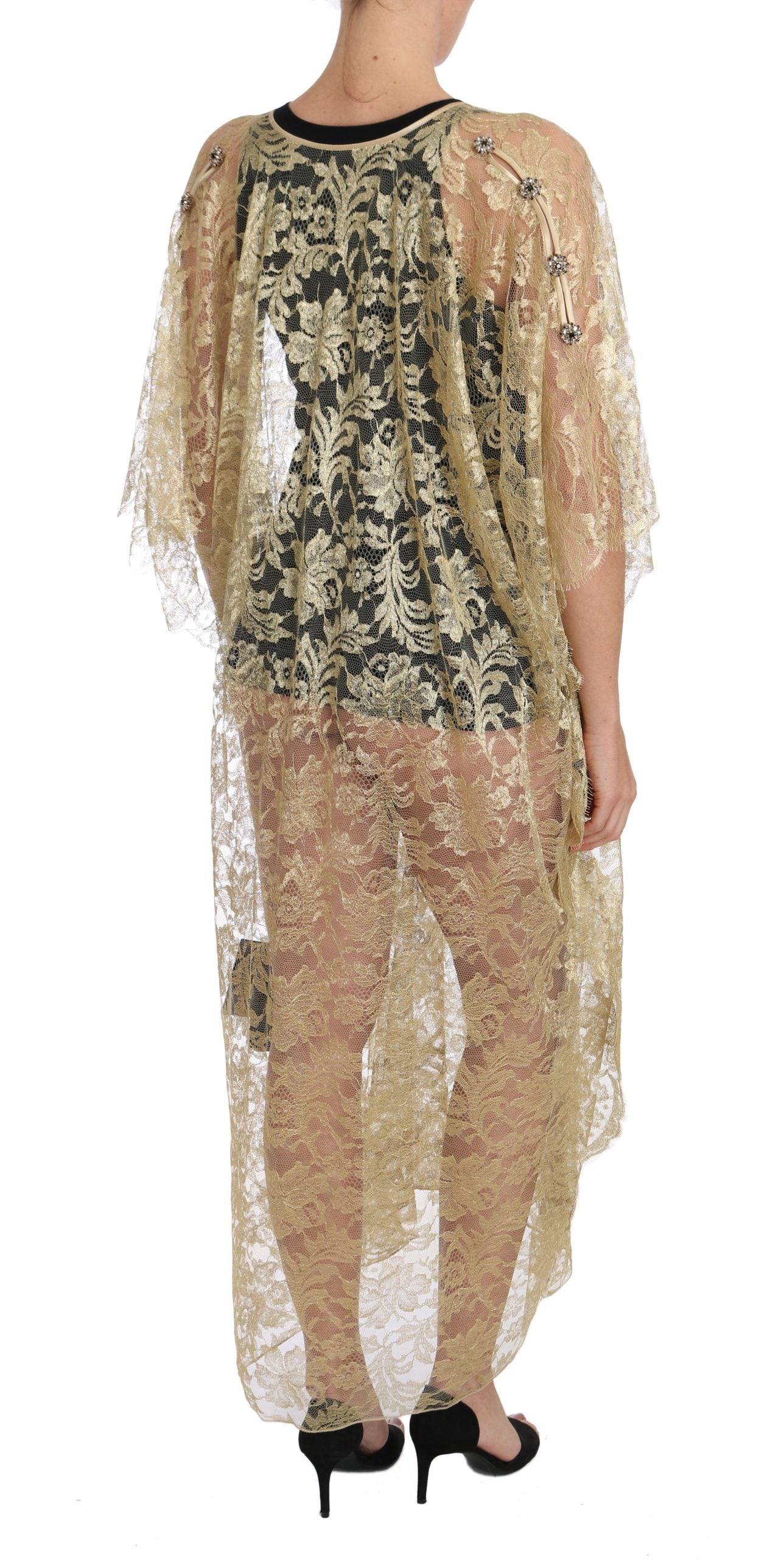 A gold floral lace crystal dress with a cape and matching pants