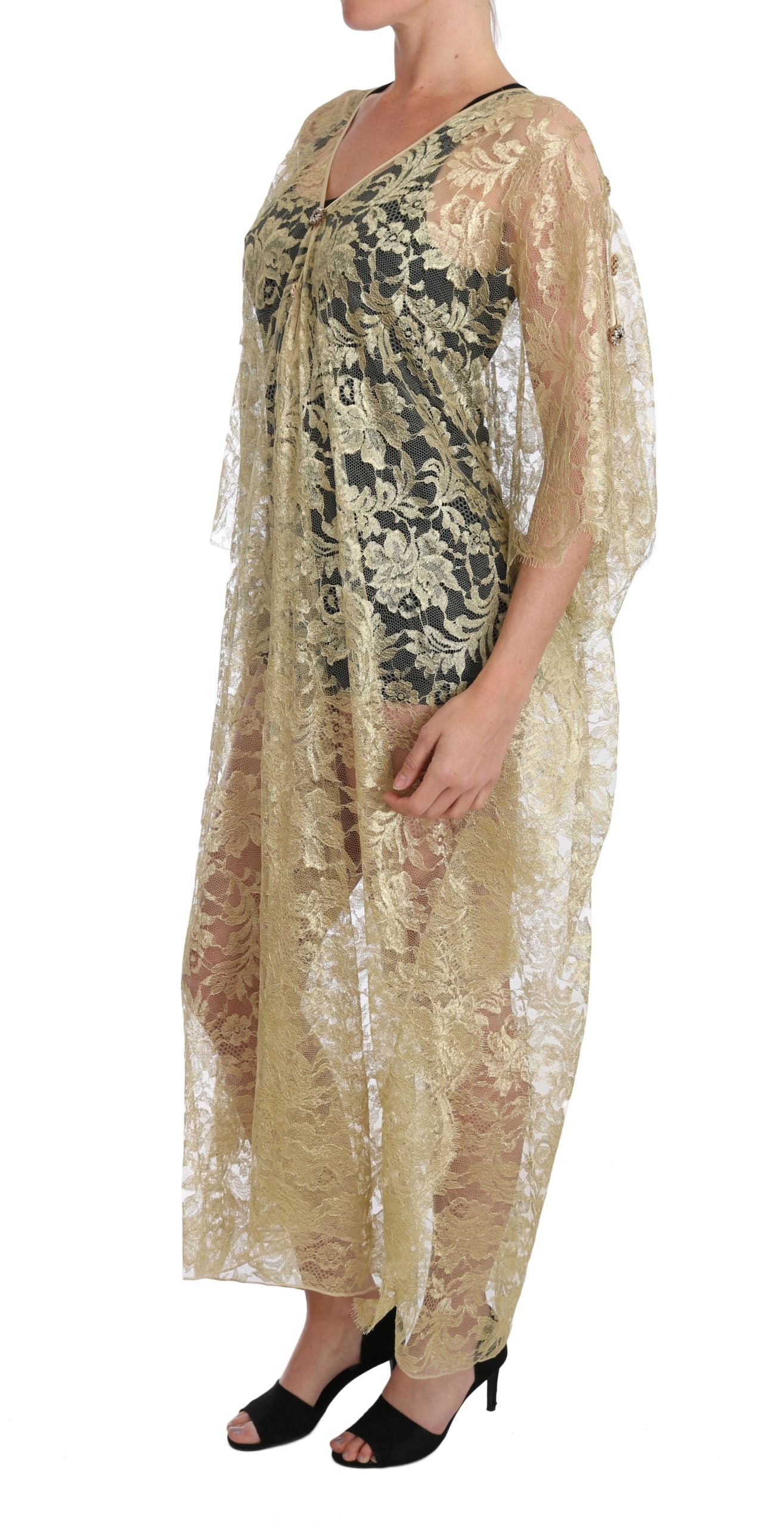 A long gold floral lace dress with crystals, featuring a cape design