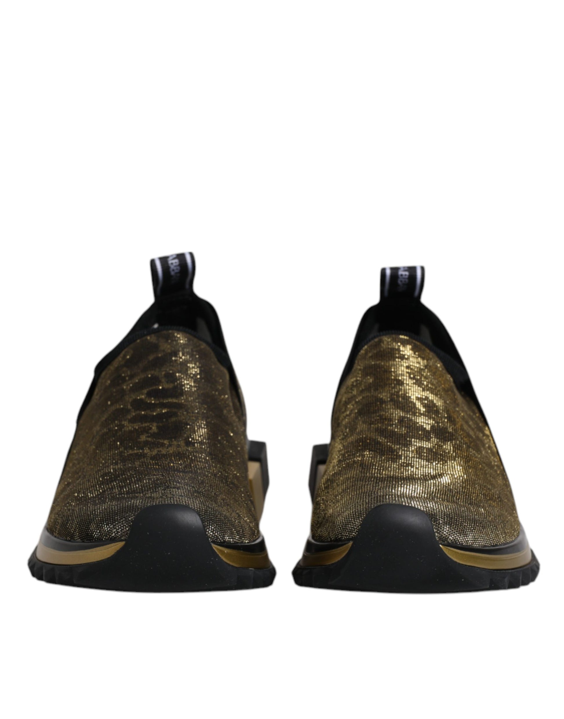 Pair of gold glittery sneakers with black laces