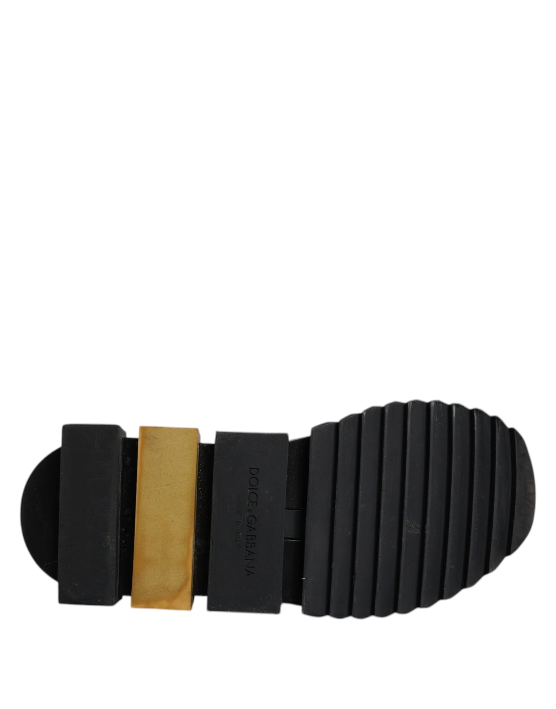 Black shoe sole with yellow stripe