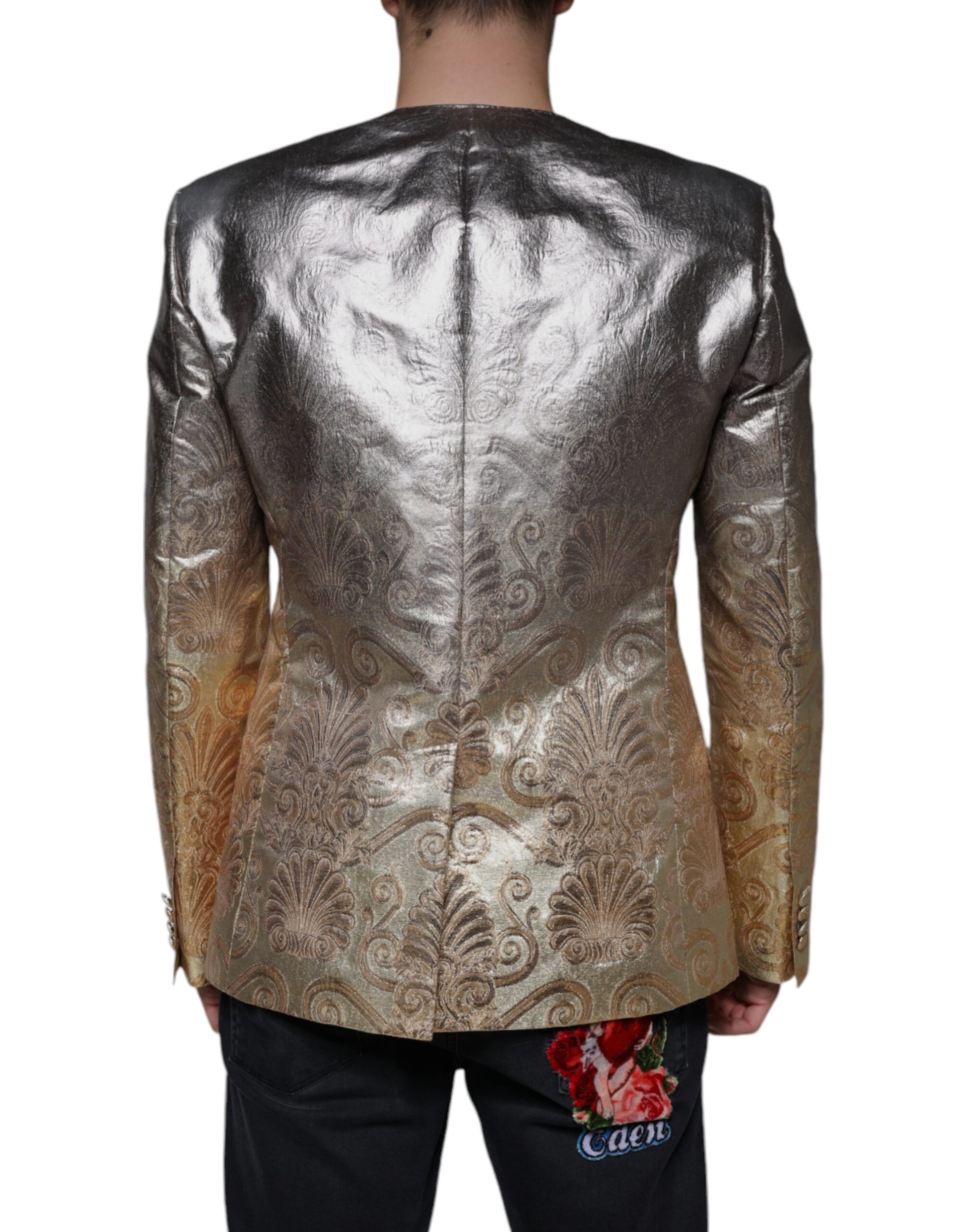 A gold jacquard single breasted dress blazer with intricate design