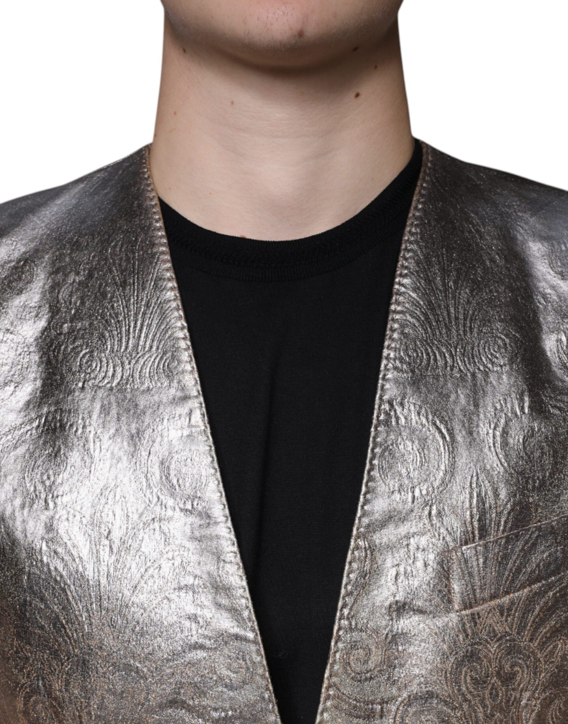 A mannequin wearing a gold jacquard single breasted dress blazer