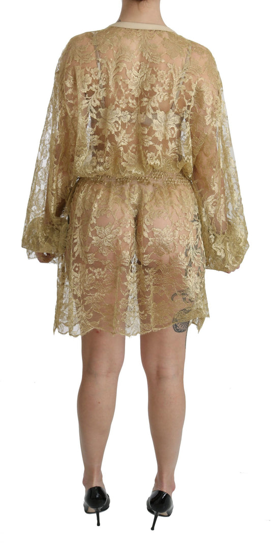 A gold lace see through dress with an A-line silhouette