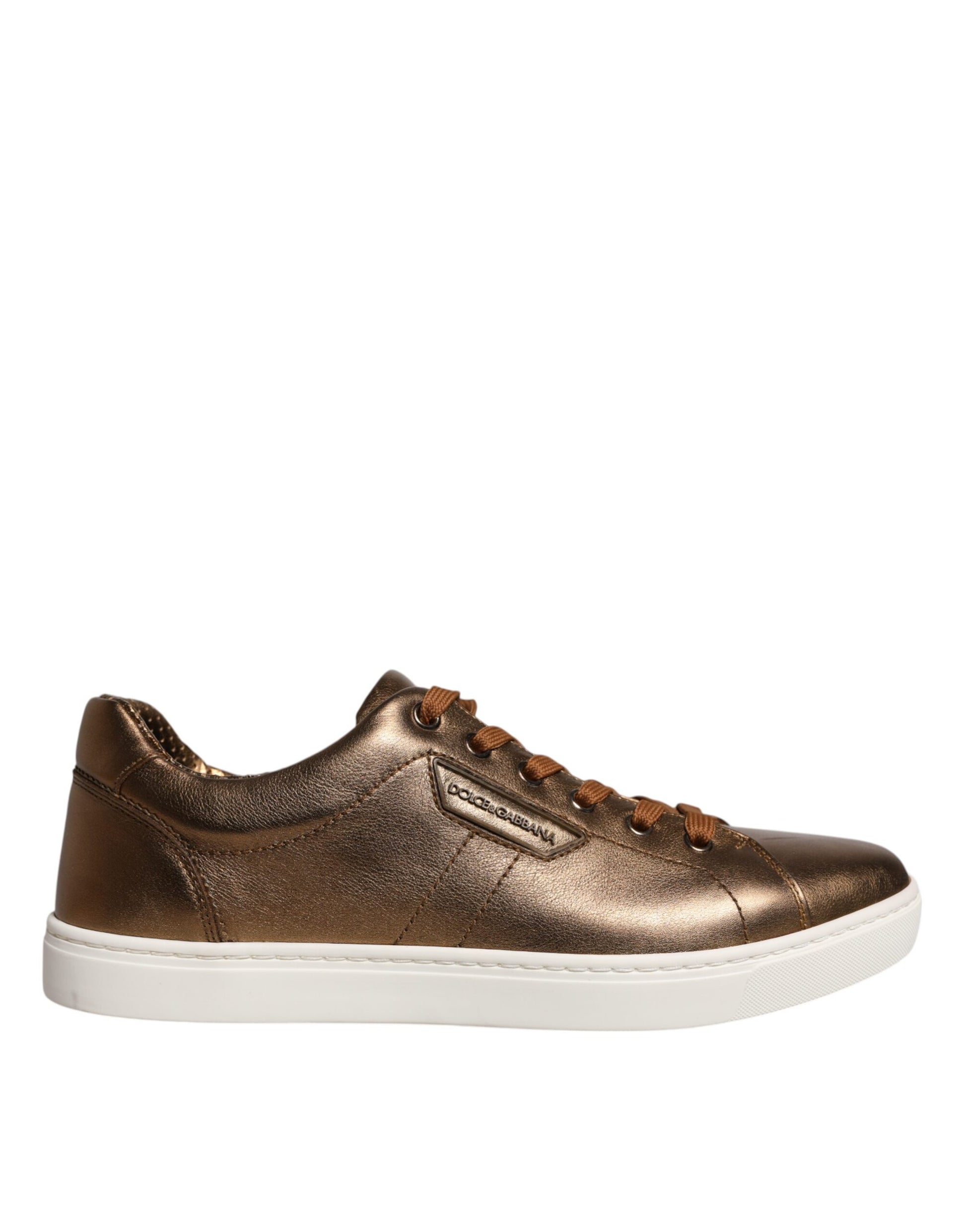 A pair of gold leather sneakers with a logo on the side, designed by Dolce & Gabbana