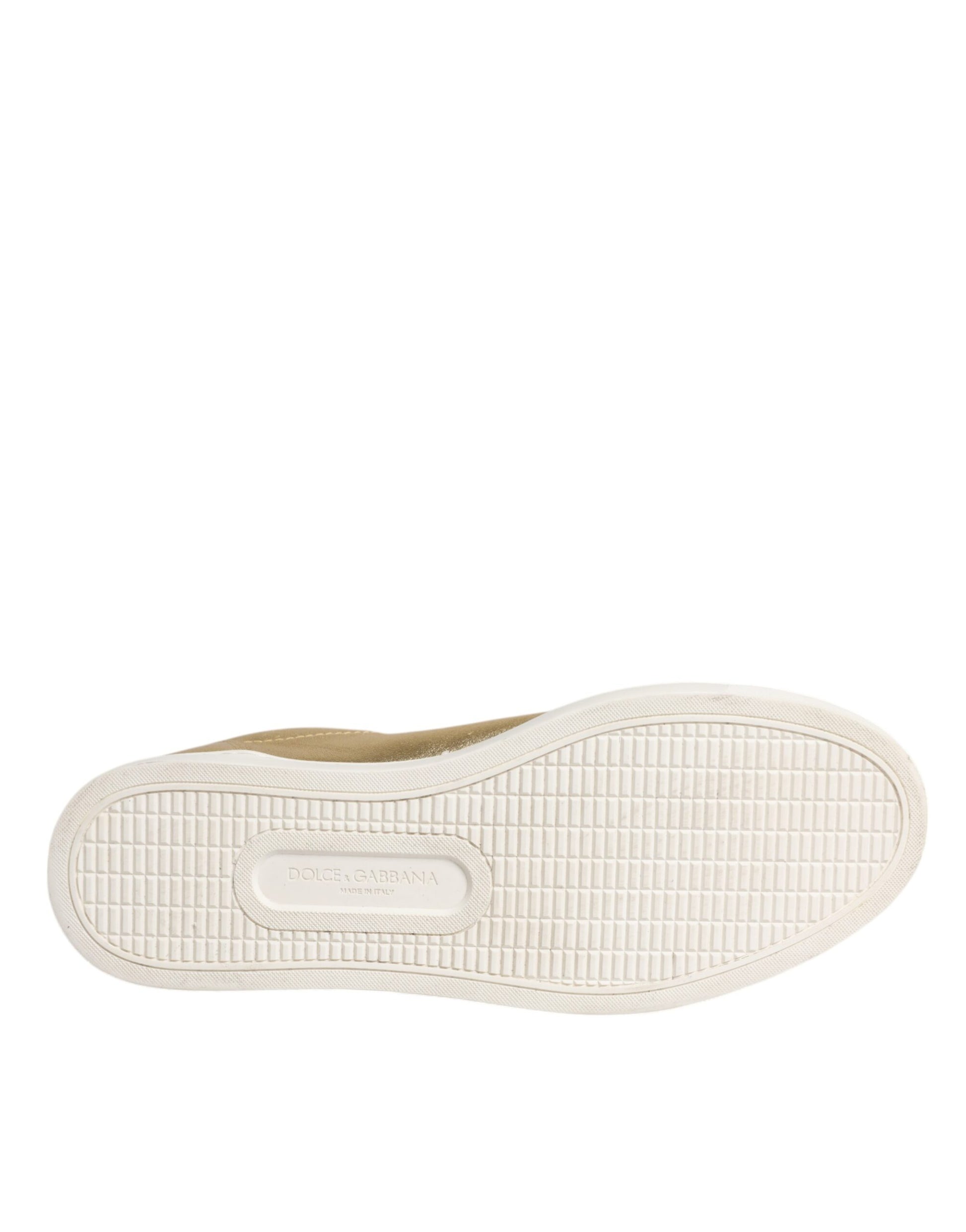 A single shoe sole against a white background. It appears to be a sneaker or casual footwear with a flat sole and a small