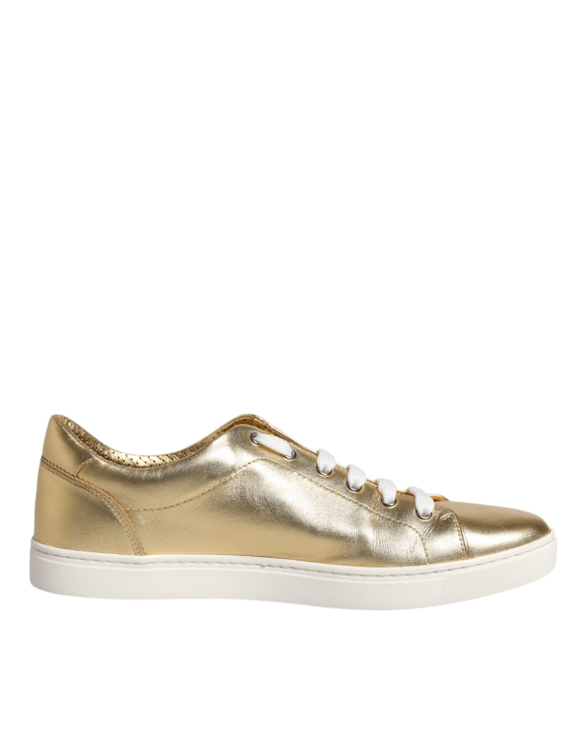 Gold glittery sneaker with white sole and laces