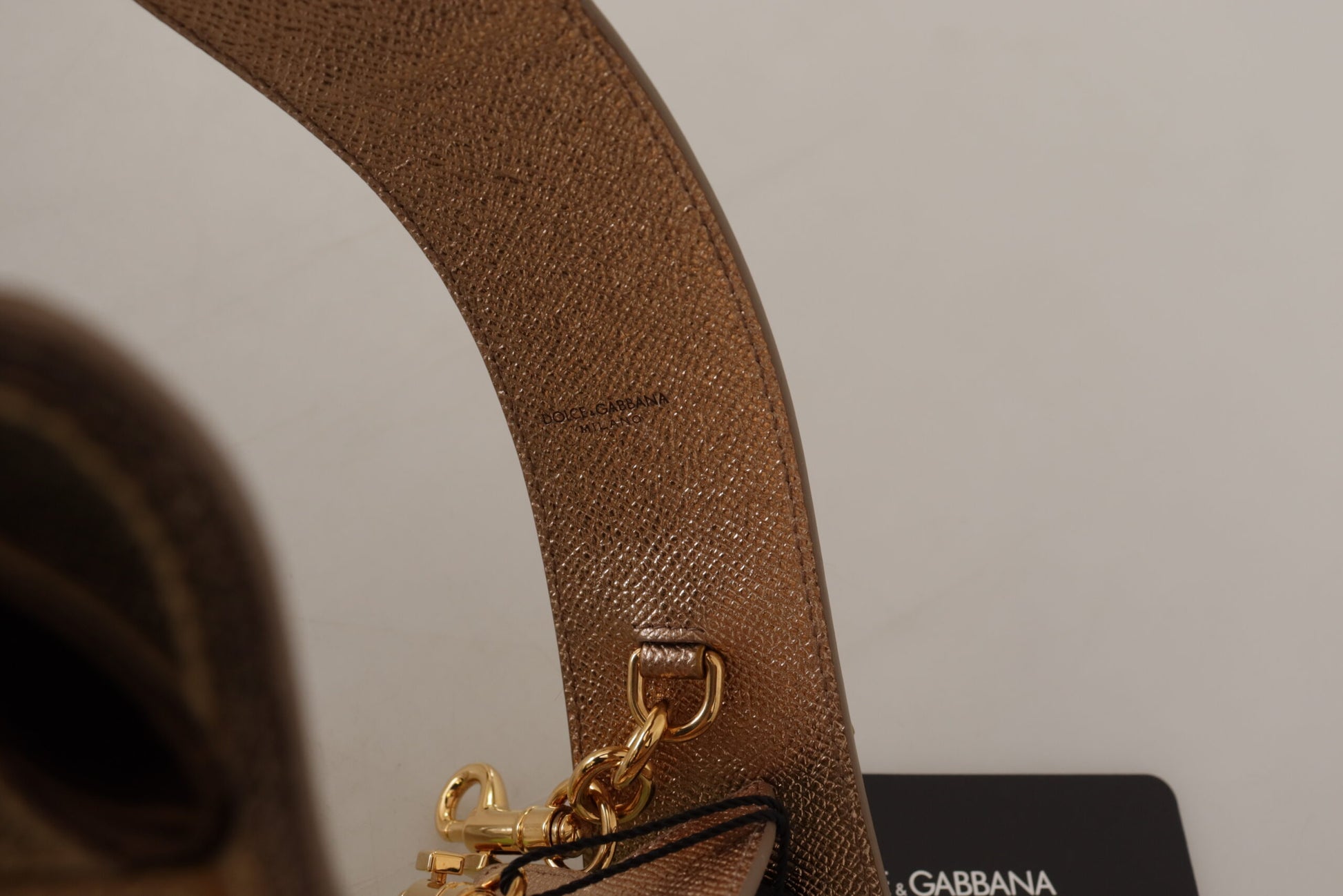 Brown leather belt with gold buckle