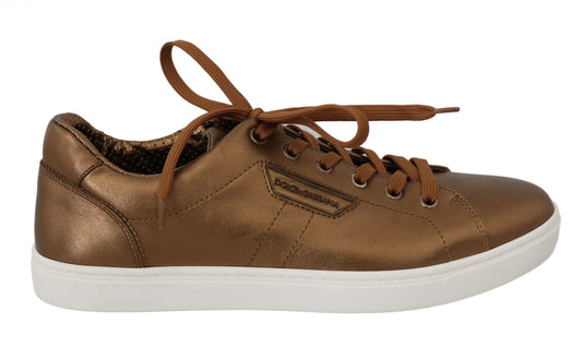 Brown glittery sneakers with white soles and laces