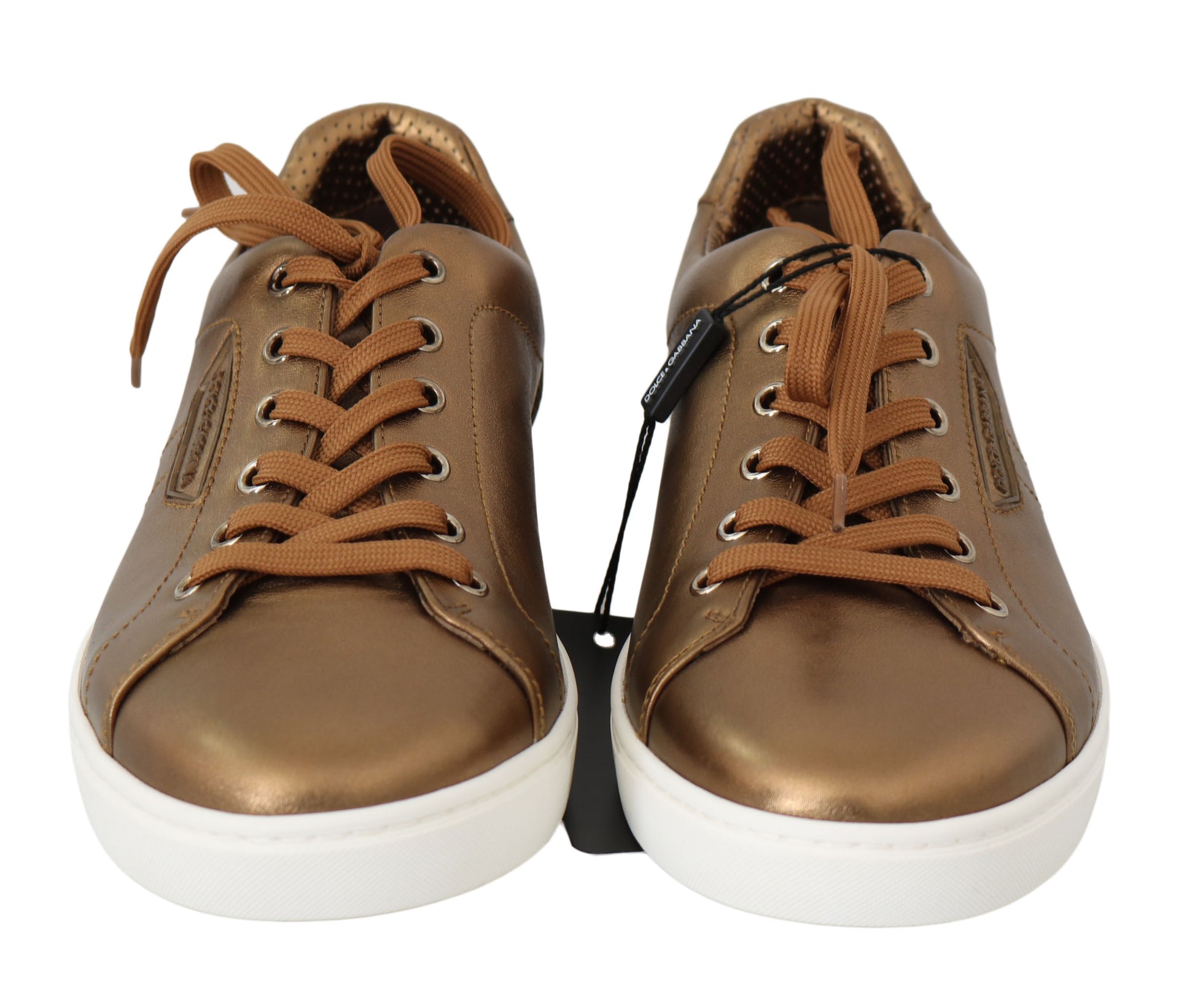 Pair of brown leather shoes with white soles and laces