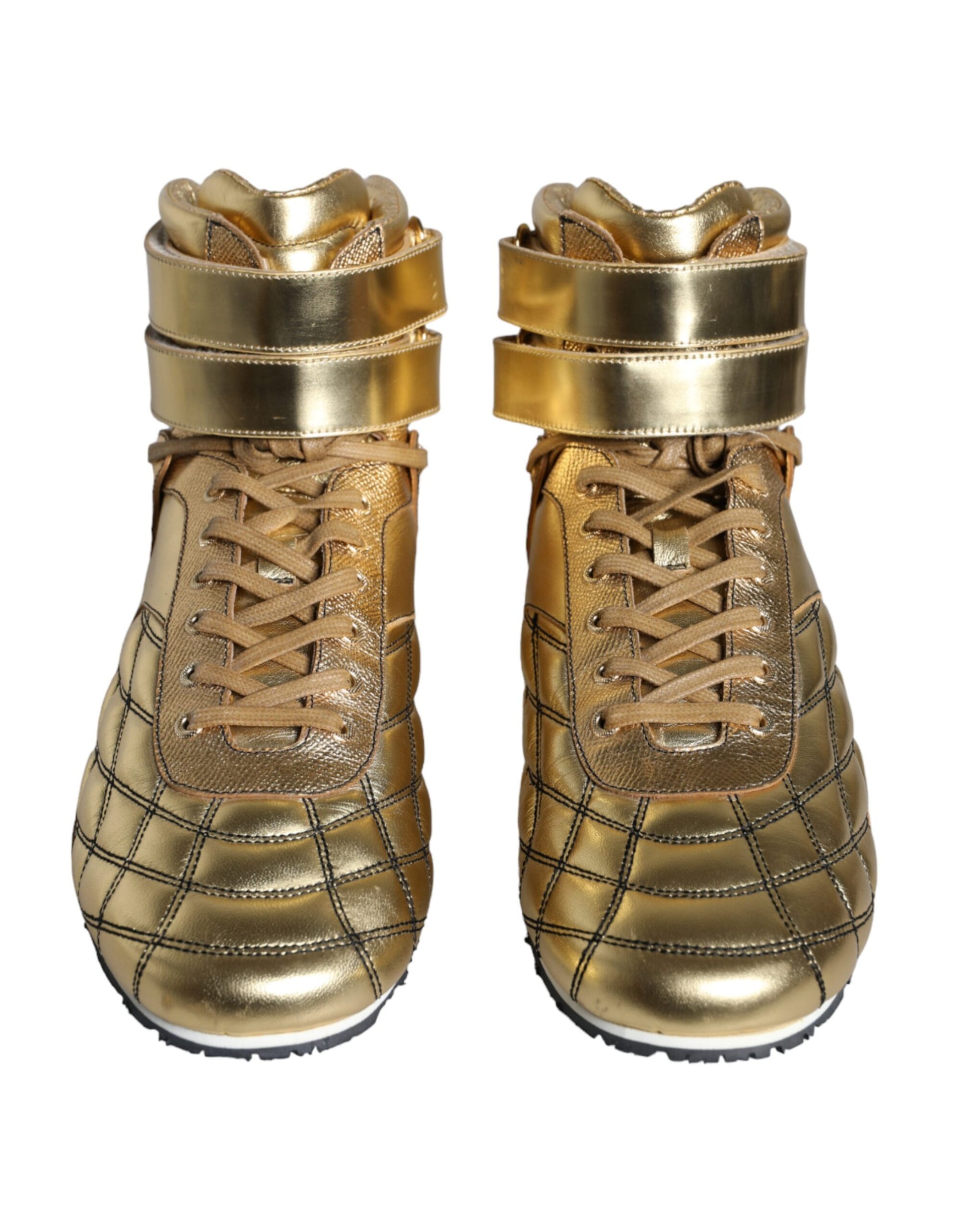 Pair of gold leather high top sneakers with laces and embellishments