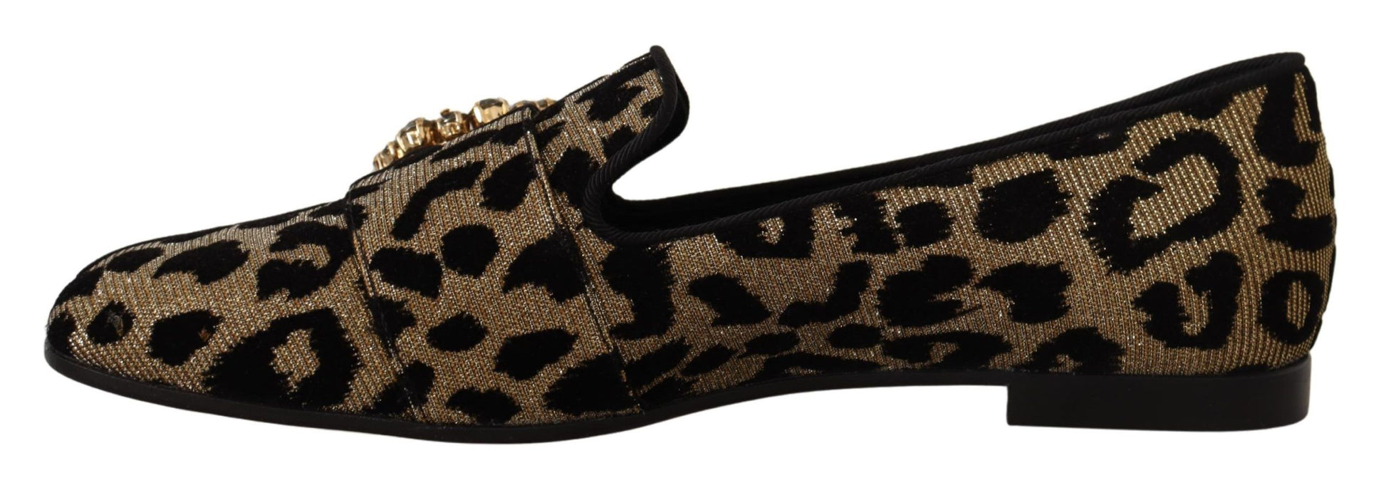 Pair of black and gold leopard print loafers with lace detailing