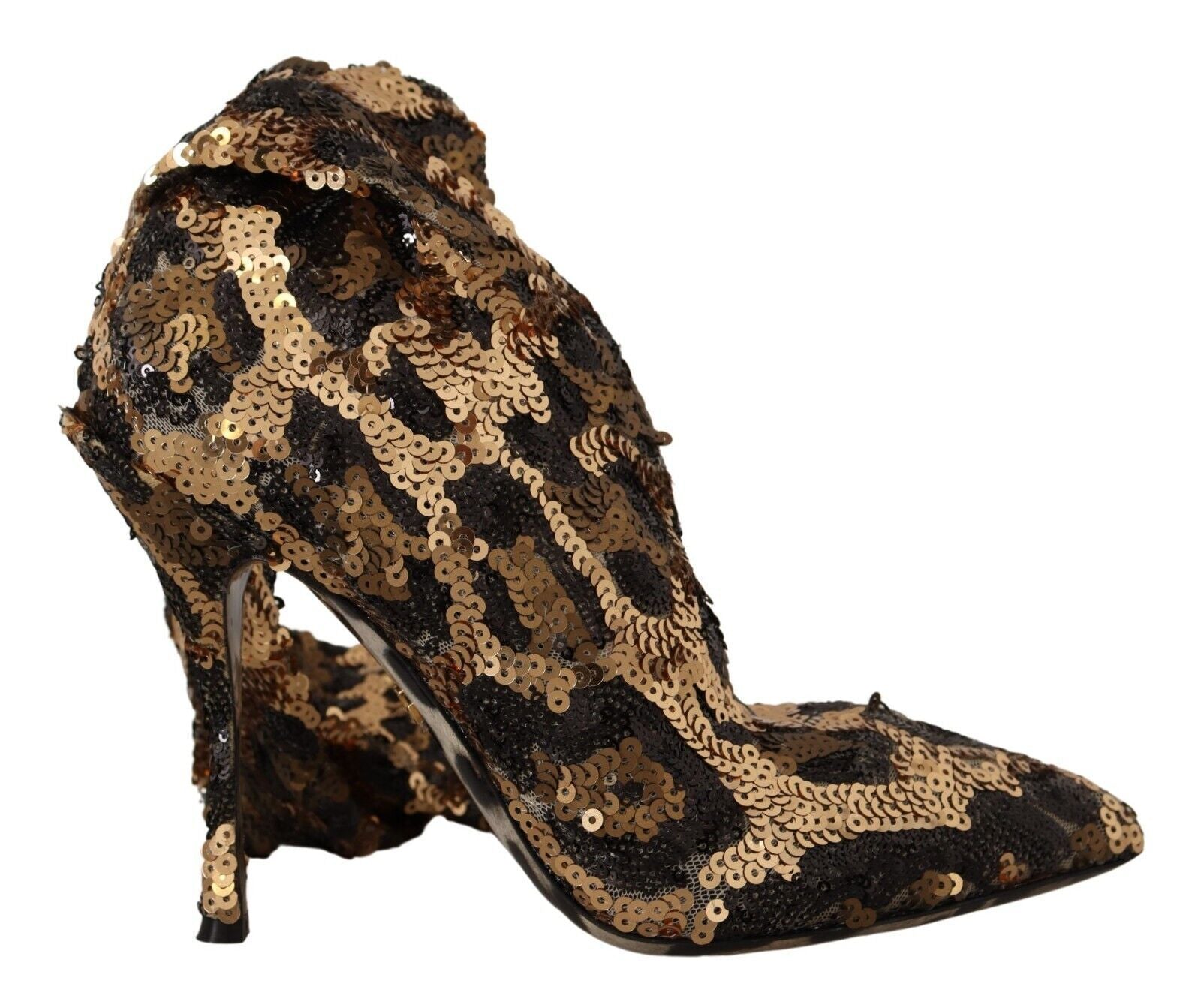 Gold glittery high heel shoe with black spots and a pointed toe