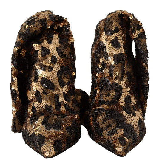 Pair of glittery boots with animal print design and gold sequins