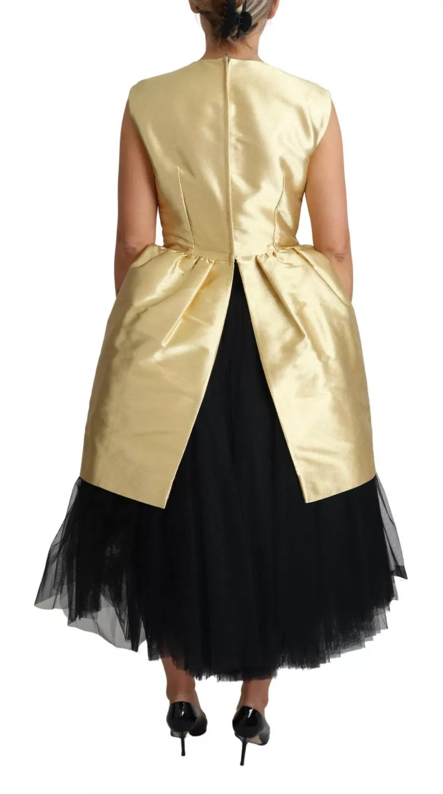 Yellow sleeveless tulle dress with black skirt and bow at back