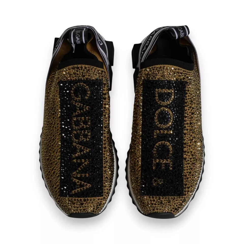 Pair of glittery sneakers with gold sequins and brand name GUCCI on side