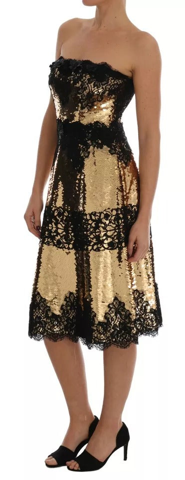 A gold sequin embellished lace dress with a strapless design, worn by a model